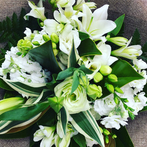 Wellington Flower Co. bouquet in greens and whites.